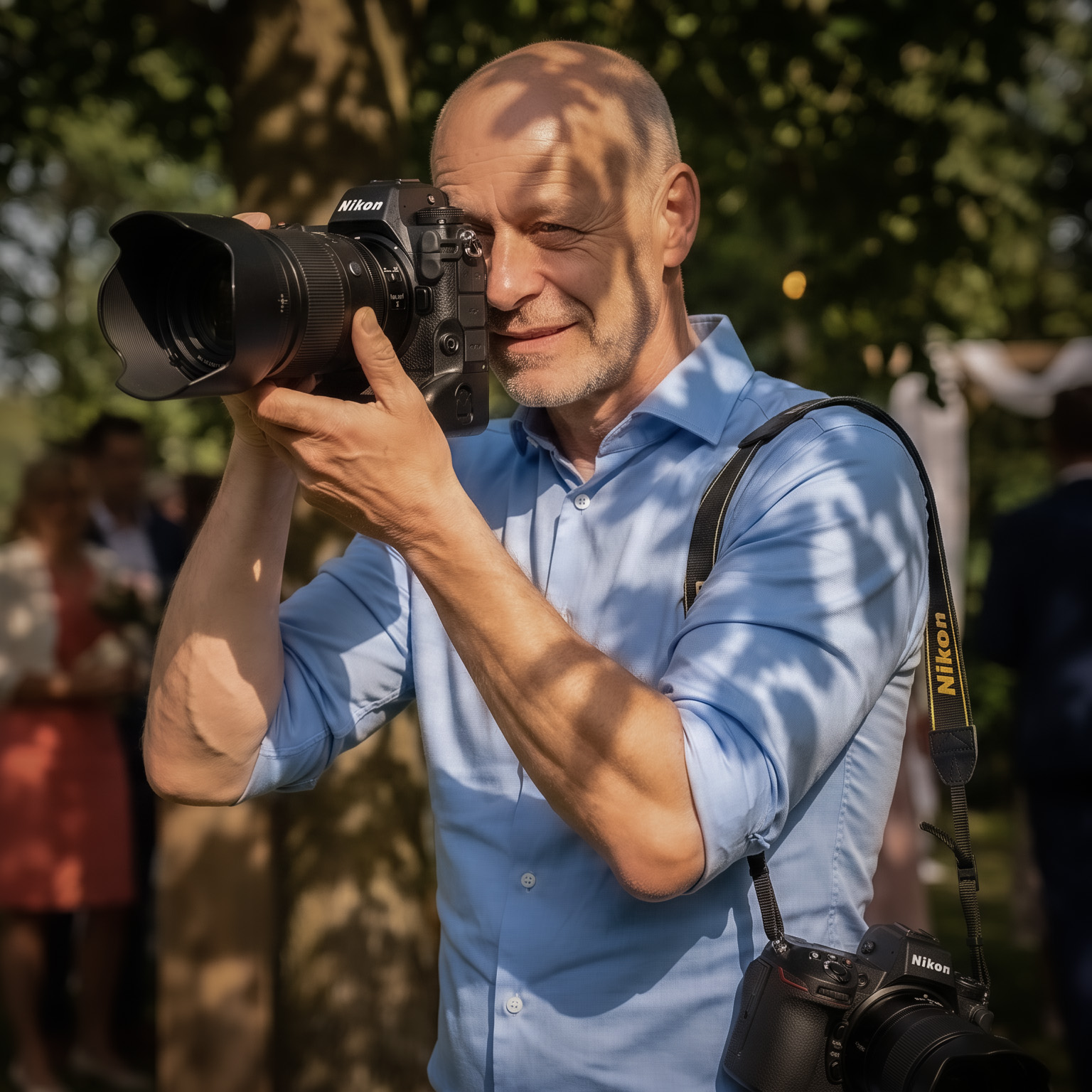 Frank taking photos at a wedding